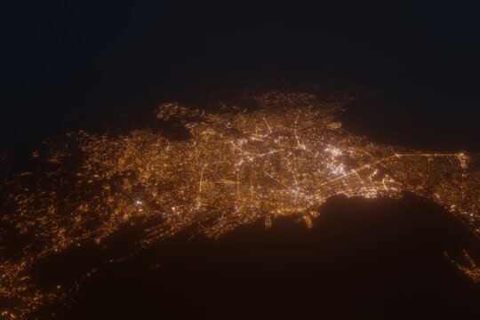 Aerial view on Quezon City (Philippines) from west. Top view on modern city at night from satellite