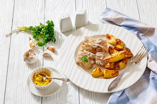 Cold meat aspic plate with crispy potatoes