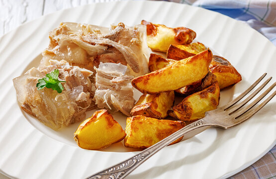 Cold meat aspic plate with crispy potatoes