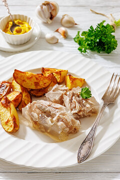 Cold meat aspic plate with crispy potatoes