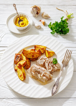 Cold meat aspic plate with crispy potatoes