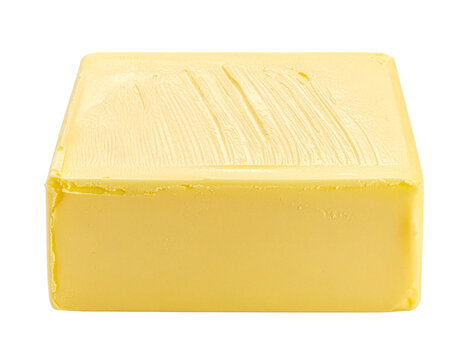 Block of yellow butter wrapped in paper.