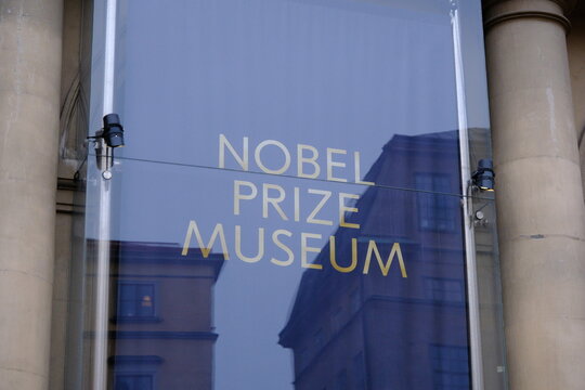 Stockholm, Sweden-Nov.27th 2025: Close-up logo sign on the entrance glass of the Nobel Prize Museum at daytime in Stockholm, Sweden