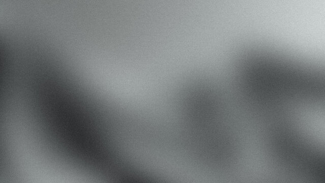Abstract blurred background with soft gray and dark shadows, representing a sense of mystery and uncertainty.