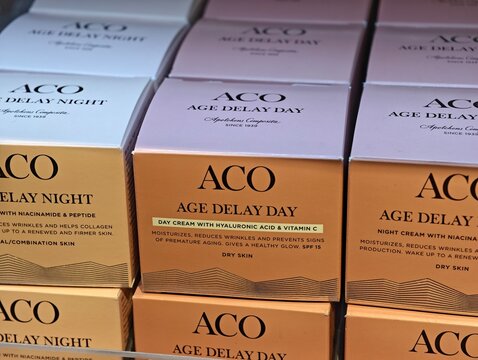 Eskilstuna, Sweden-Nov.27th 2025: ACO Age Delay series skincare product paper boxes on a store shelf.
