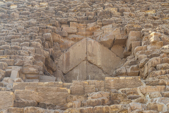 Close up of the original entrance gate of the Cheops pyramid (also known as the Great Pyramid), related to Cheops pharaoh, in Giza complex, Cairo, Egypt.