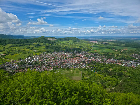 germany, aerial panorama above neuffen showcasing rooftops surrounded by breathtaking swabian jura natural landscapes