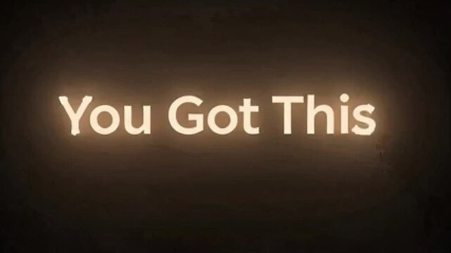 A glowing, encouraging message 'You Got This' displayed prominently on a dark, textured background, symbolizing motivation and support.