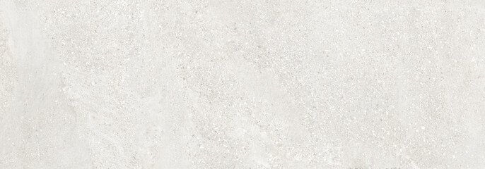 White terrazzo texture with natural stone particles and beach sand inspired earthy surface pattern. Rustic architectural background with warm neutral tones. © Vidal