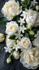 Obraz premium White Roses and Peonies on Wet Dark Stone