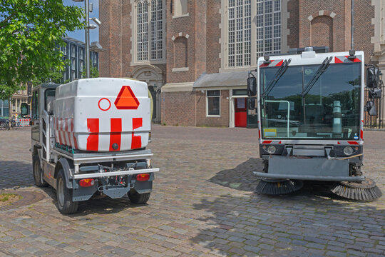 Street Sweeper Machine Cleaner Vehicle Parked in Front of Church Amsterdam Netherlands