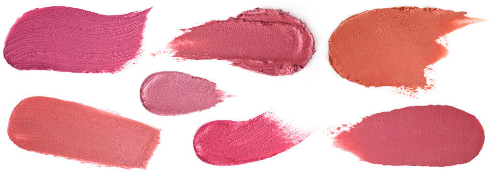 Variety of cosmetic lipstick smears smears isolated on white background.