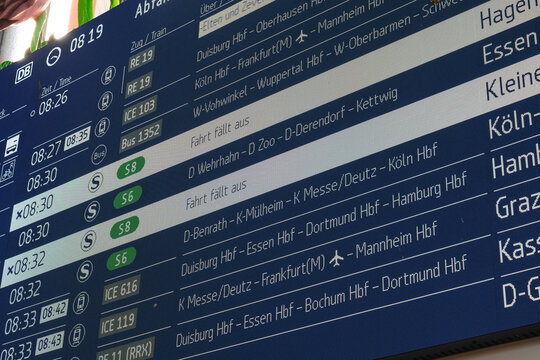 Dusseldorf, Germany - June 26 2026: Departure board displaying train schedules at Dusseldorf Hauptbahnhof railway station