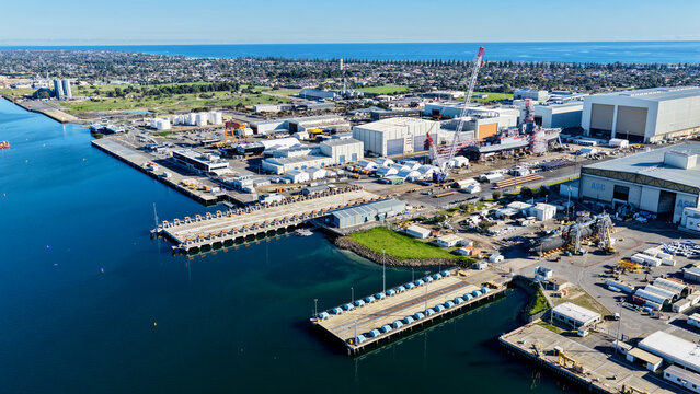 Osborne, Adelaide, South Australia &ndash; 4K aerial drone view of Port Adelaide River, industrial waterfront, ASC Shipyard, maritime facilities, coastal wetlands and North Haven.