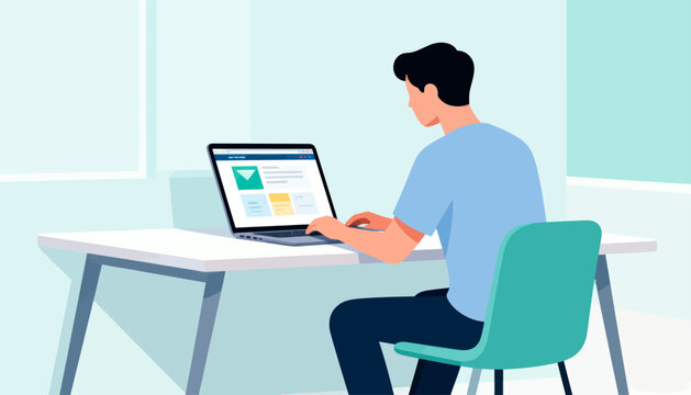 Man sits at desk, focused on laptop screen