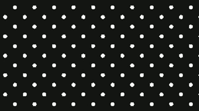 Seamless pattern of white polka dots on a black background, a classic and versatile design element.