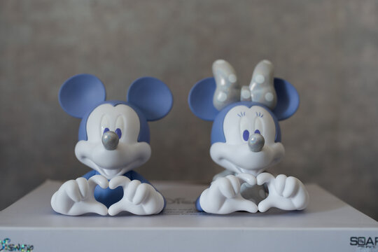 Bangkok, Thailand - June 26, 2026 : Mickey Mouse and Minnie Mouse. Love Hand Mini Bust