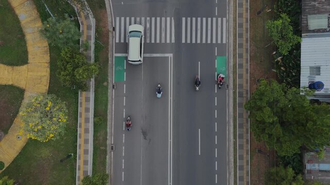 Top Down Aerial View of City Road with Bike Lane and Traffic