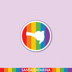 Fototapeta premium Rainbow pride sticker with Santa Catarina state silhouette. Perfect for LGBTQ+ prints, cards, merchandise and creative digital projects.