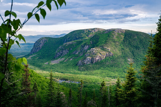 Warm sunset light over wonderful mountains of ZEC des martres and its lush foliage, Dome mountain, Charlevoix, QC, Canada