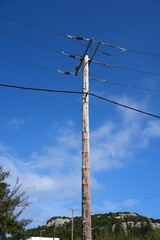 Obraz premium Electric grid in Rhodes island in Greece. Wooden electric pole.