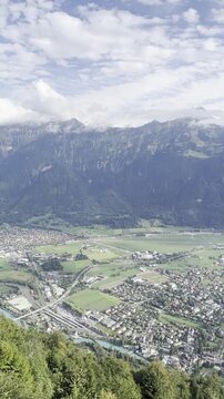 Breathtaking panoramic vista from harder kulm showcasing lake brienz and interlaken nestled in the majestic swiss alps