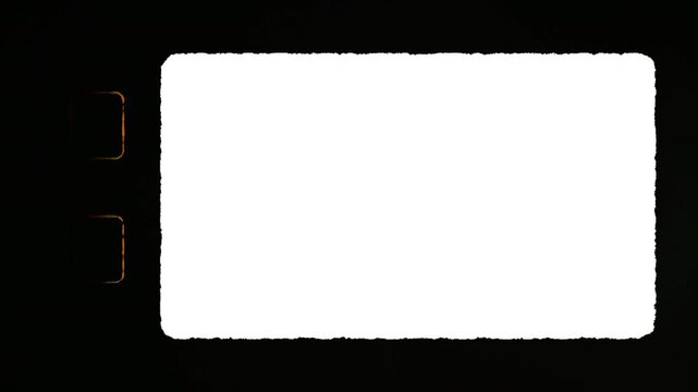 Super 8 film Effect. Suitable for cinematic projects and design elements. Vintage border of sixteen millimeter film frame on dark background for creative visuals.