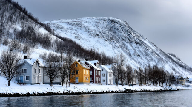 Beautiful view of winter landscape cold frosty day among mountains and warm cozy house in modern style. Rest, vacation, winter holidays away from city bustle. Relaxation and peace, winter background