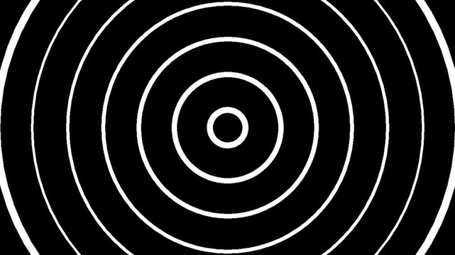 Concentric circles radiating outwards on a black background, creating a hypnotic visual effect.