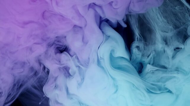 Abstract Purple and Blue Ink Swirling in Water on Black Background