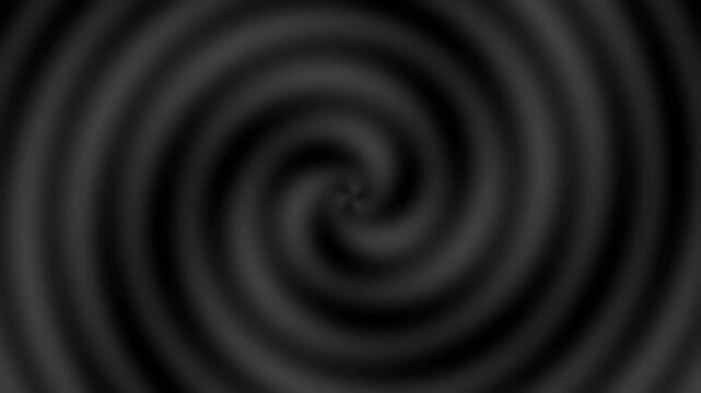 Abstract dark gray swirling spiral pattern with concentric circles creating a hypnotic effect.