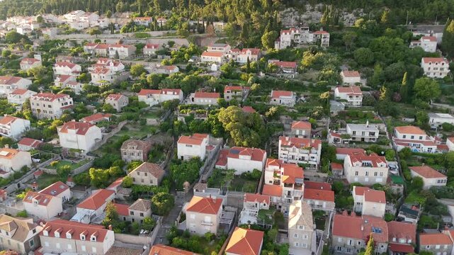 Aerial flyover of a hillside residential neighborhood in Dubrovnik