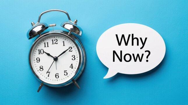 Alarm Clock with Why Now Speech Bubble on Blue Background.