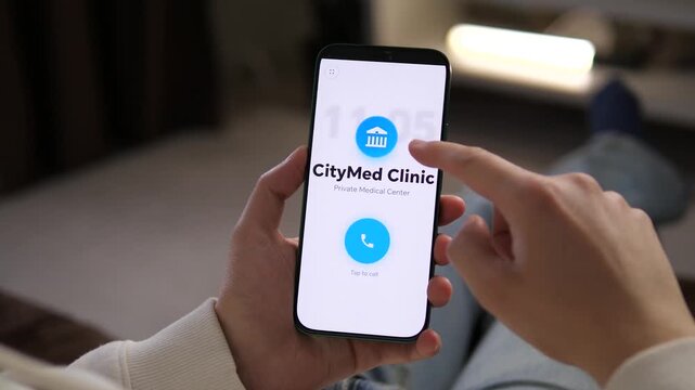 Tapping to call Med Clinic on a smartphone. The screen displays a blue call button and the clinic name. Perfect for telemedicine, private healthcare, and medical appointment booking visuals