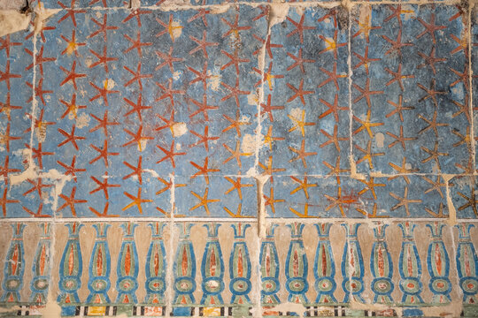 Ancient Egyptian art of the interior ceiling, painting of stars and night sky, Temple of Hatshepsut, Luxor, Egypt