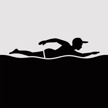 Man swimming on his stomach in water wearing a baseball cap