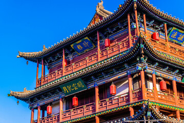 Fototapeta premium Datong, China - May 9 2026: The imposing façade of Datong Drum Tower showcases traditional Chinese architecture with elegant wooden construction, layered roofs, and enduring historical grandeur