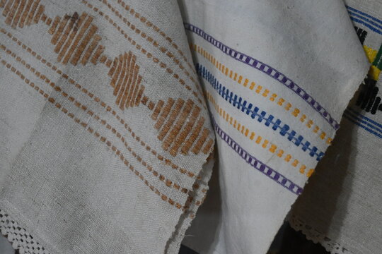 Traditional handmade linen towels with embroidery details.