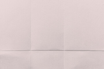 Fototapeta premium Textured pale pink paper background