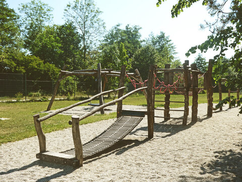 Garching-Hochbrueck, Germany - Public kid park: climbing paths with ropes and natural wood