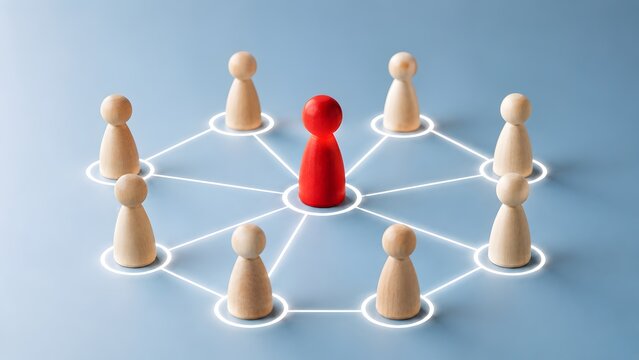 Leadership and team management network concept with a central red wooden figure connected to a team by glowing white lines
