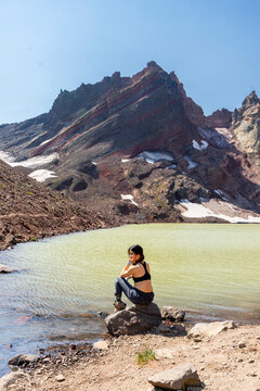 woman in sports bra sitting view No Name Lake, Bend, Oregon