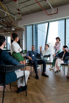 Diverse team meeting in modern office space.