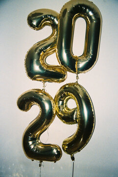 Film Photo of Gold Balloons Shaping 2029 for New Year Celebration