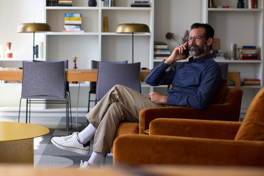 CEO Makes Call in Office