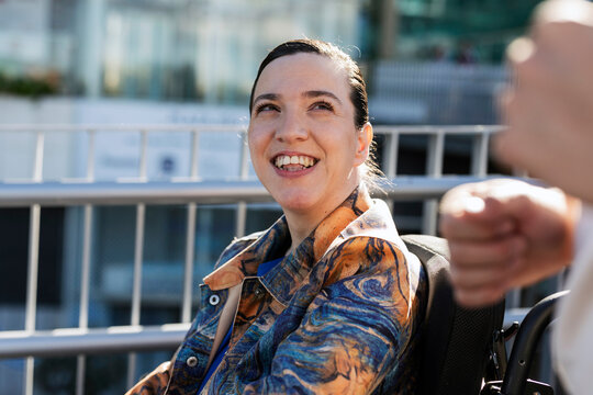 Happy woman experiencing joy and smiling at events