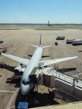 Commercial Airplane Parked at Airport Gate