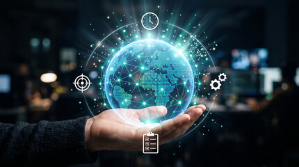 Fototapeta premium Human hand holding a glowing digital globe with network connections and business for planning, timing, and goals in a dark office setting