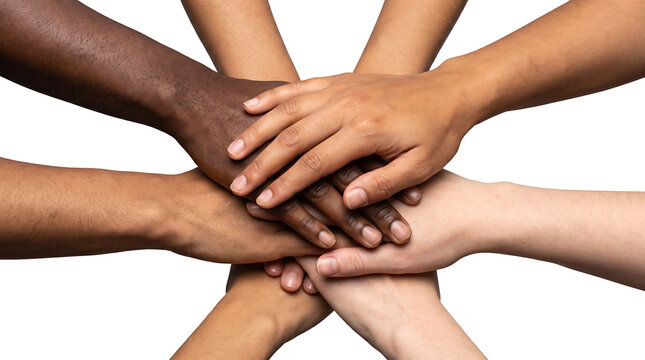 Diverse hands stacked together symbolizing unity and teamwork