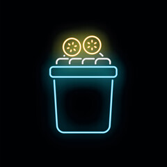 Popcorn bucket glowing with neon light, conceptualizing movie night snacks © anatolir